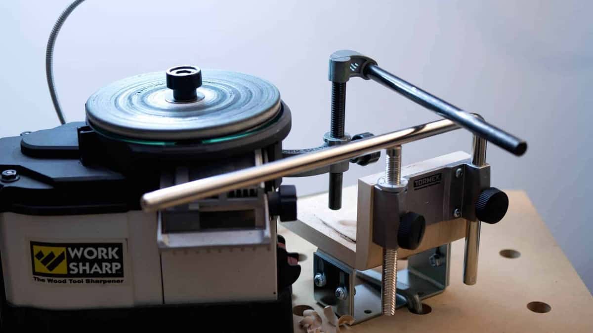Work Sharp glass disc beside a bolted Tormek bar
