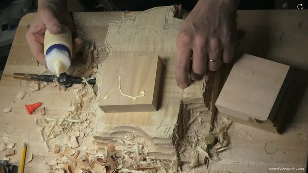 Glue bead squeezed onto a carved base
