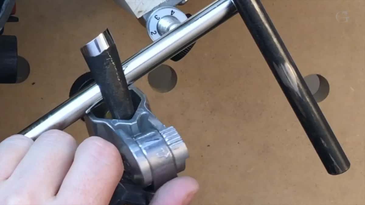 The finished bevel, mirror bright across the whole slant of the edge.