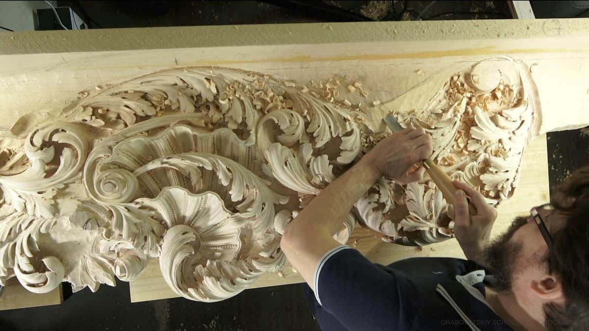 Carved acanthus leaf detail showing eye, turnover and undercut shadow in limewood