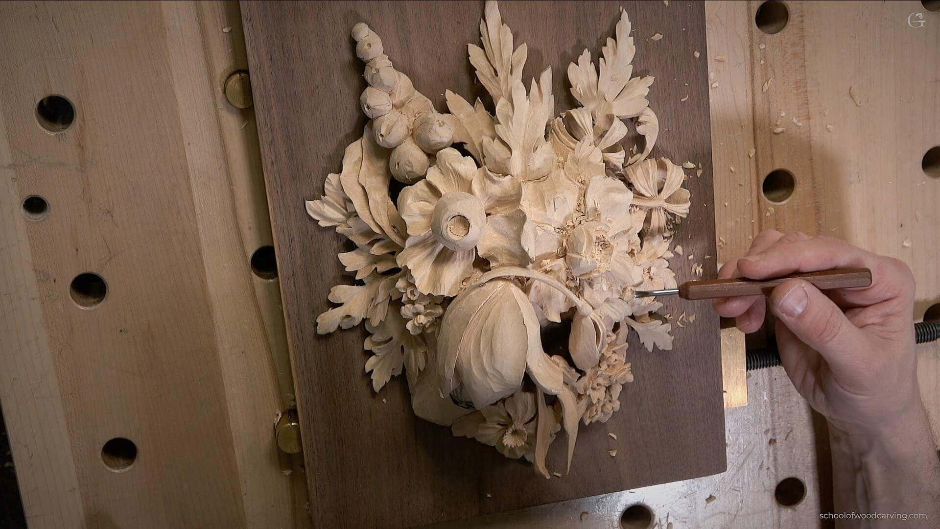 What is the first step in wood carving?