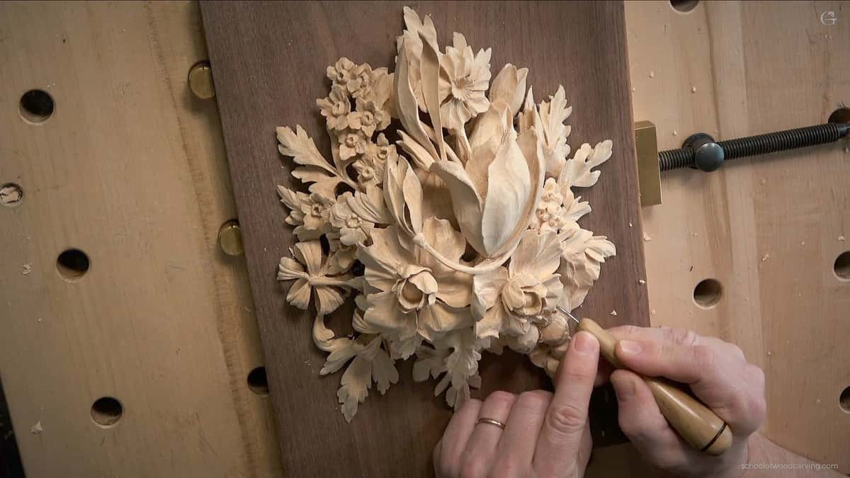 Alexander Grabovetskiy Teaches how to Carve Wood. Unleash your creativity and hone your woodcarving skills with Alexander Grabovetskiy's in-person Maine Woodcarving class. His expertise in the intricate and delicate Grinling Gibbons-style will help you create stunning wood carvings that are truly unique. German: Alexander Grabovetskiy lehrt Holzschnitzerei. Entfesseln Sie Ihre Kreativität und verfeinern Sie Ihre Holzschnitzfähigkeiten mit Alexanders In-Person Maine Woodcarving-Kurs. Seine Expertise im filigranen und delikaten Grinling Gibbons-Stil hilft Ihnen, atemberaubende Holzschnitzereien zu schaffen, die wirklich einzigartig sind. Russian: Александр Грабовецкий учит резьбу по дереву. Разблокируйте свою креативность и оттачивайте свои навыки резьбы по дереву с Александром Грабовецким на личном уроке по резьбе по дереву в штате Мэн. Его опыт в тонком и изысканном стиле Гринлинга Гиббонса поможет вам создавать потрясающие резные изделия из дерева, которые действительно уникальны. Spanish: Alexander Grabovetskiy enseña a tallar madera. Desata tu creatividad y perfecciona tus habilidades de tallado en madera con el curso en persona de Alexander Grabovetskiy en Maine Woodcarving. Su experiencia en el intrincado y delicado estilo Grinling Gibbons te ayudará a crear impresionantes tallados en madera que son realmente únicos. Chinese: 亚历山大·格拉博韦茨基教你如何雕刻木材。通过亚历山大的现场缅因州木雕课程,释放你的创造力,磨练你的木雕技巧。他对于Grinling Gibbons风格的熟练掌握将帮助您创建独特而惊人的木雕作品。 Japanese: アレクサンダー・グラボヴェツキーによる木彫りのクラス。アレクサンダー・グラボヴェツキーの直接指導の下、クリエイティブな能力を解放し、ミーン州における木彫りクラスで木彫りの技術を磨き上げましょう。グリンリング・ギボンスのスタイルの緻密で繊細な技術に精通している彼の知識を生かして、本当にユニークな見事な木彫作品を作成できます。