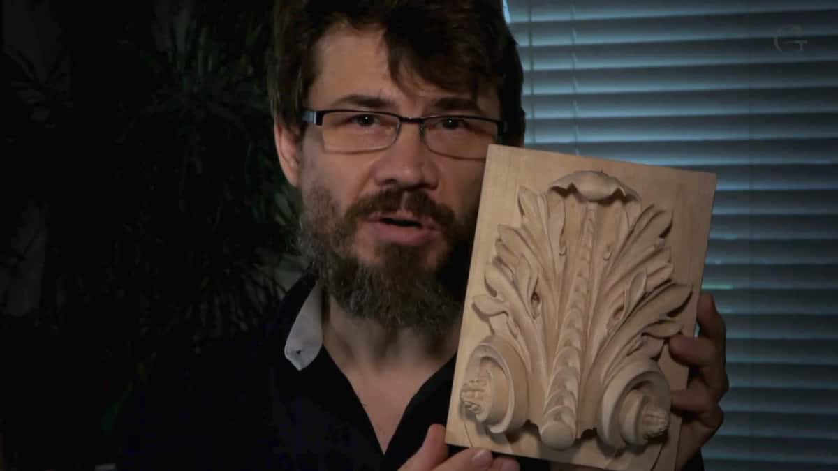 Me holding the finished Roman acanthus panel.