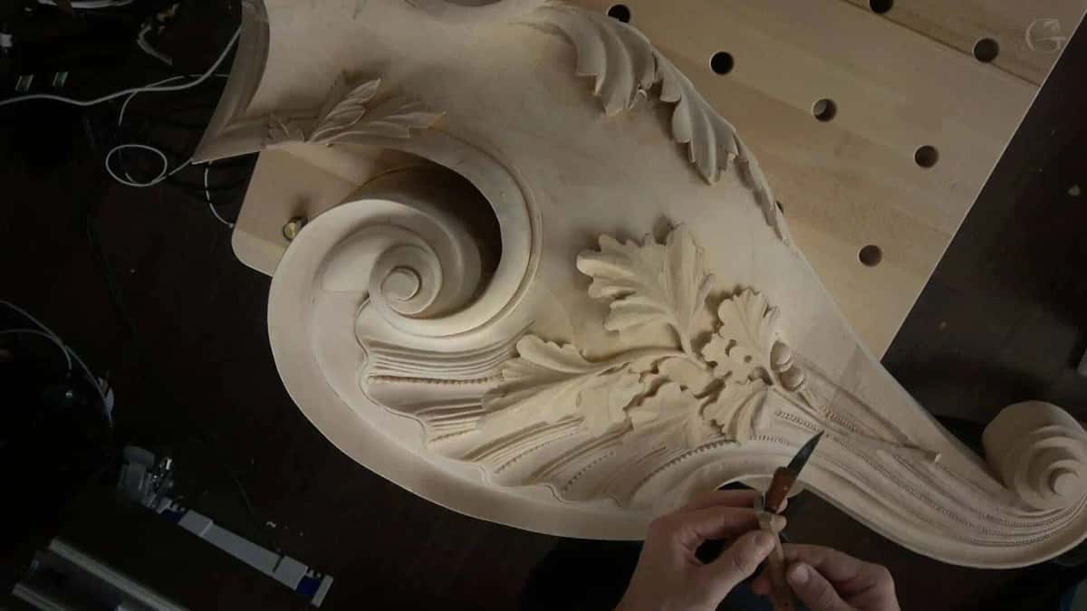 An architectural console carved loose, volute and acanthus
