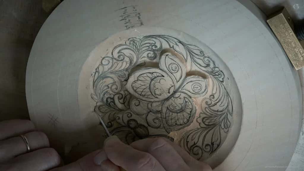 The butterfly pattern drawn onto a round blank before any carving starts
