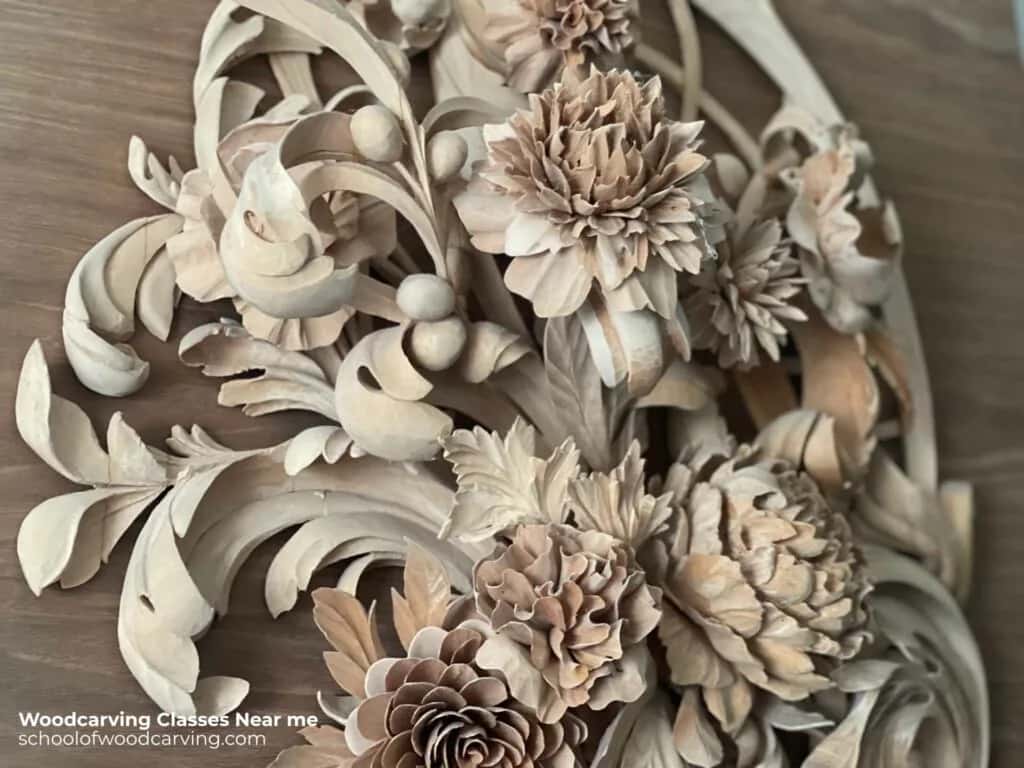 Acanthus and open flowers cut so deep the top blooms stand almost free of the ground