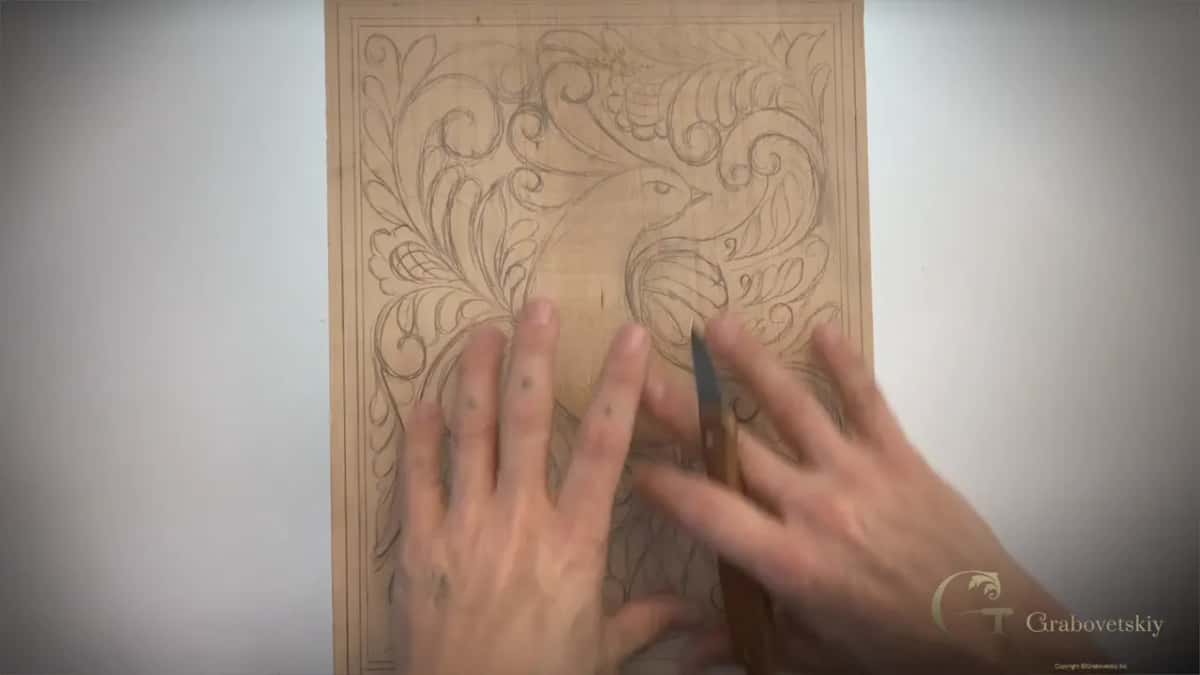 Two flat palms on a pale board drawn over in pencil