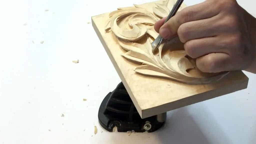 Carving a Greek acanthus leaf on a swivel board