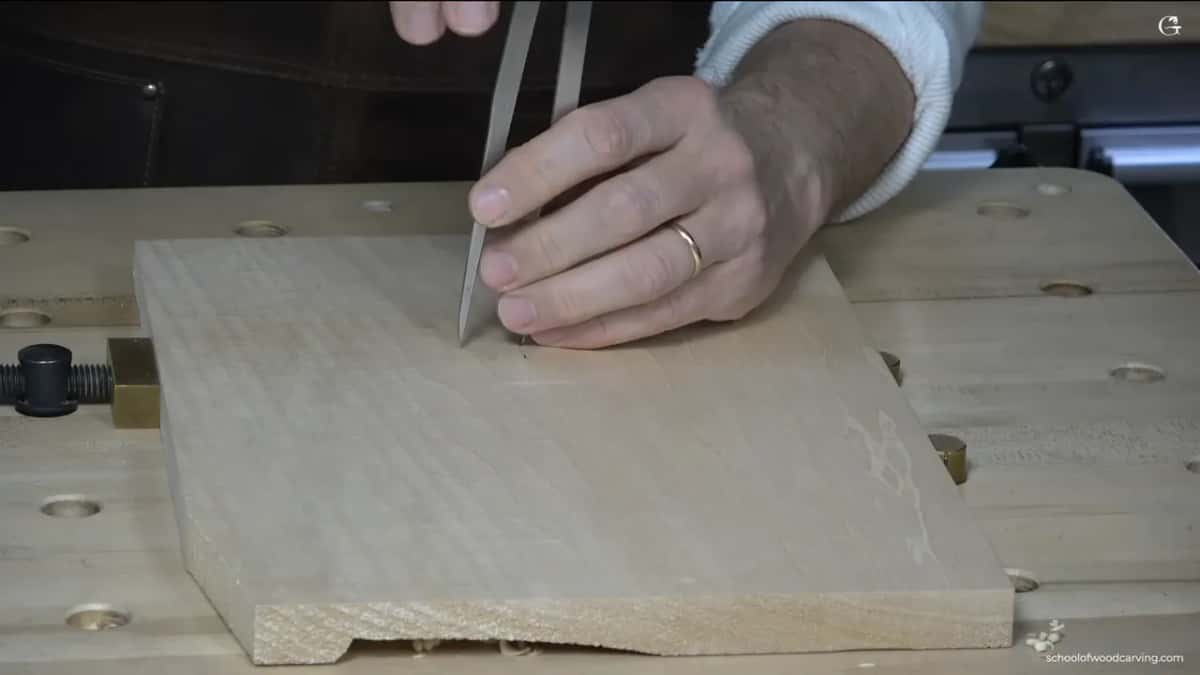 Calipers scratch the outside circle right into the wood