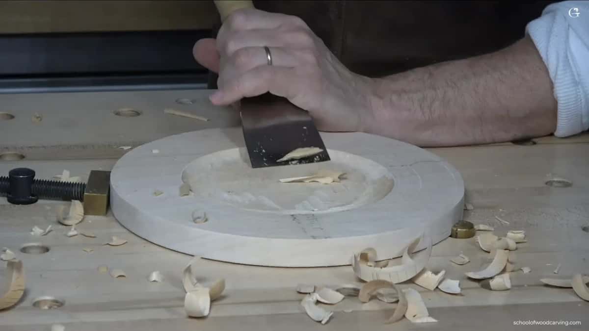 My widest gouge levels the hollow, and shavings go all over the bench