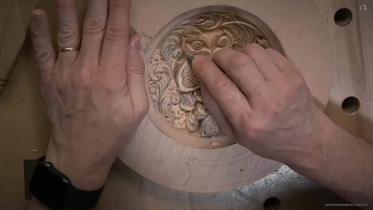 Cleaning the carved middle by hand, using the edge itself, no abrasive anywhere near it