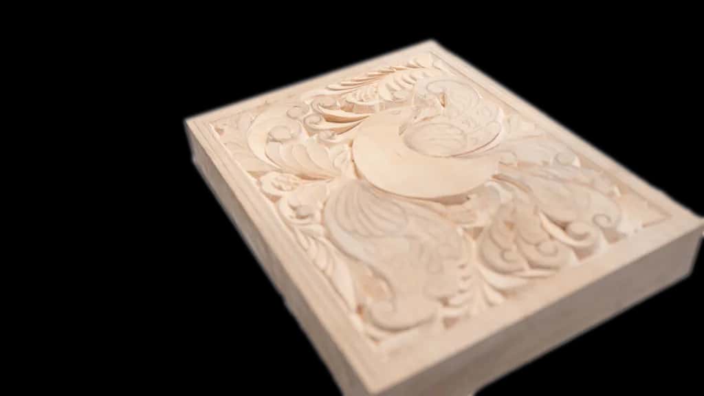 The finished curly bird board, carved end to end with a single knife