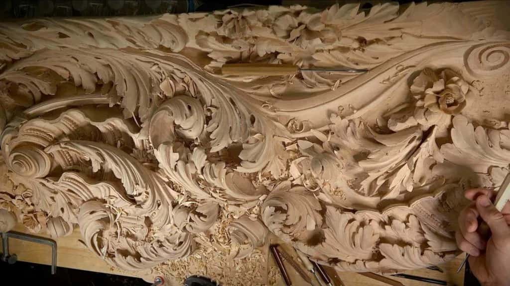 Deep relief on a commissioned panel, the sort of work that takes decades of hands to reach
