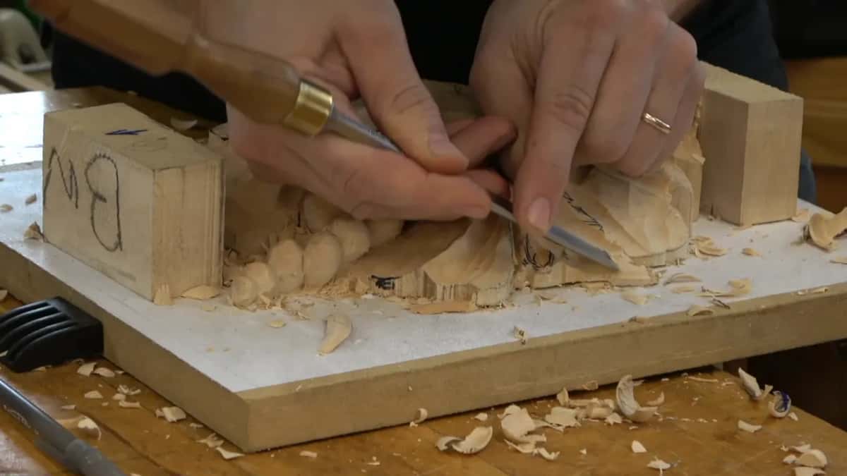 Wide tool slicing the last facets away