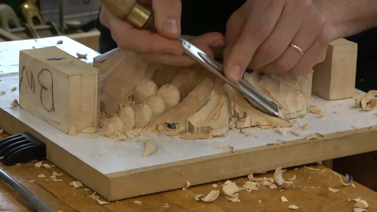 Blending the ridge away with the side of the blade