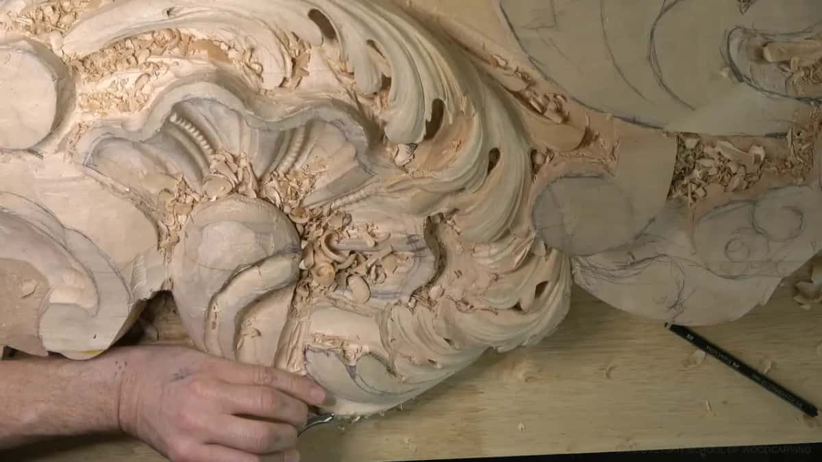 Tip of a small gouge at the lower edge.