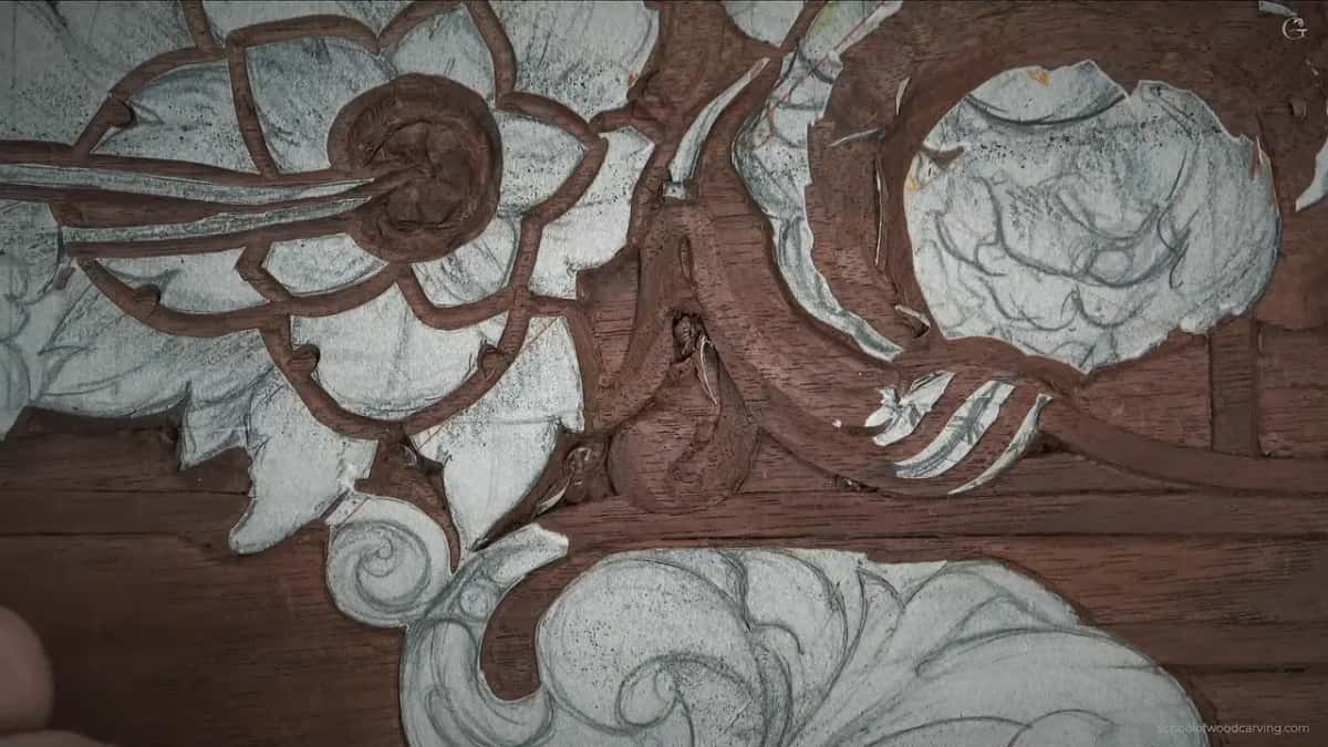 Shavings lying where they fell on the carving.
