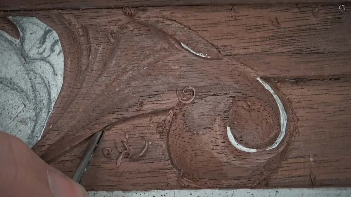 Eye and pipe together, the blade slipping in under the edge above them.