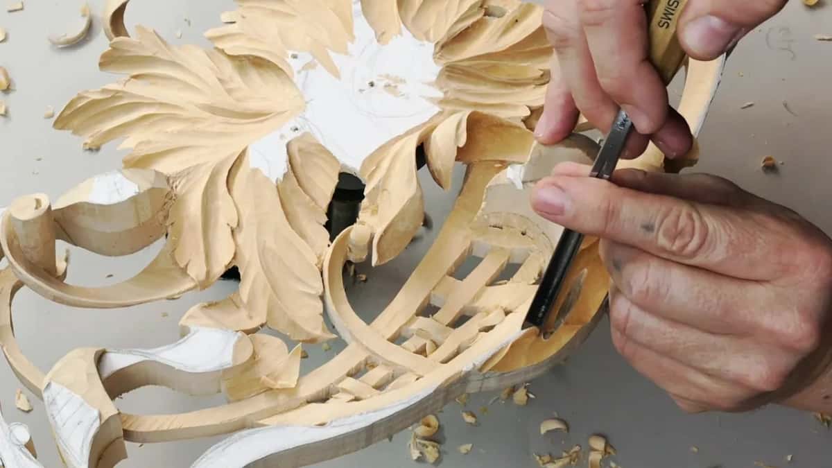 Two hands, one narrow steel tool