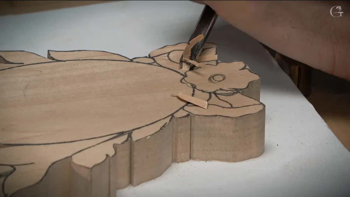 Gouge lifting a chip straight off the drawn flower