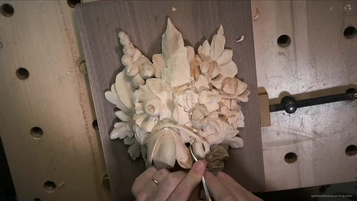 Back bent going into the tulip, the whole Grinling Gibbons style panel clamped down on its walnut ground
