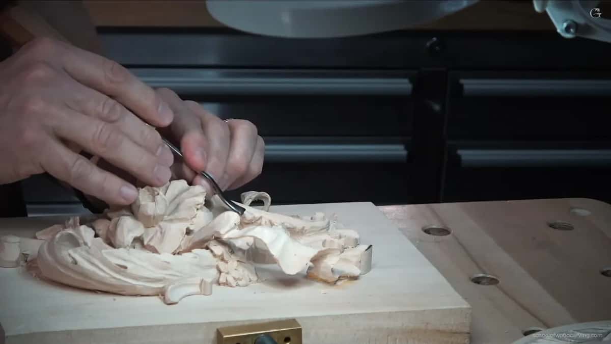Two hands guiding the tool.