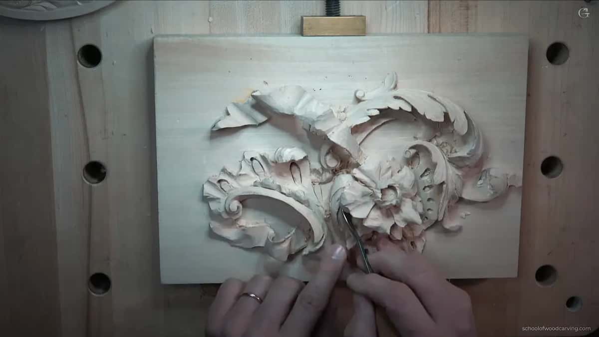 Shaping a scroll at the edge of the panel.
