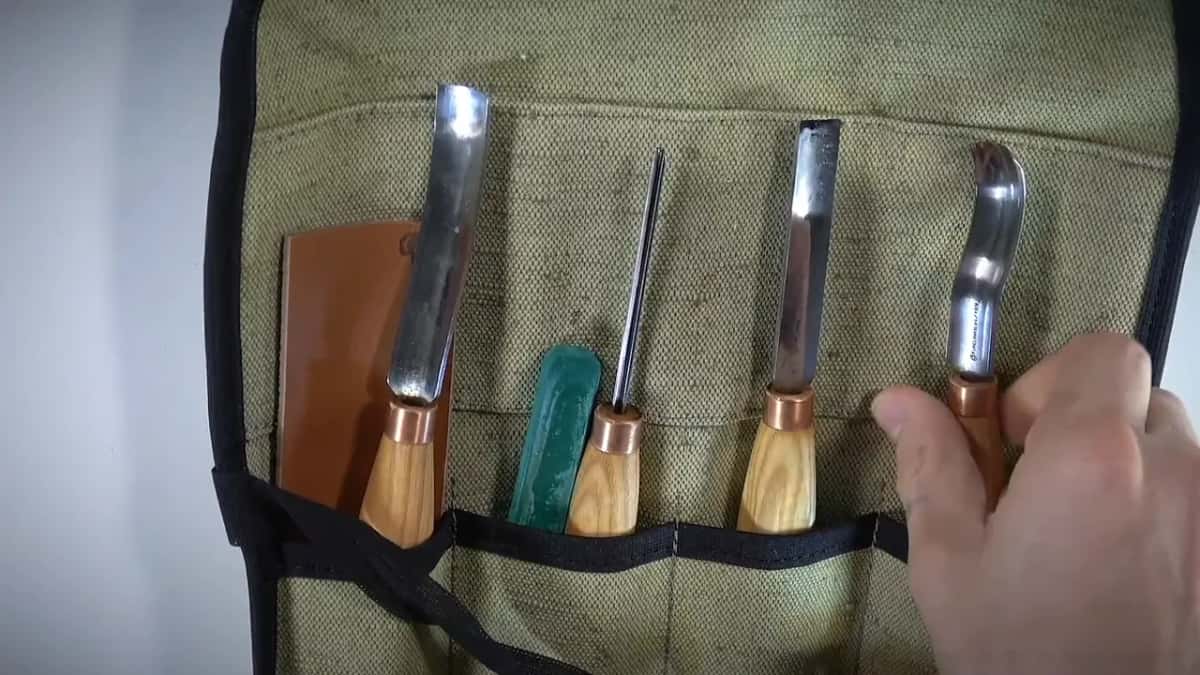 Four tools and a leather strop.