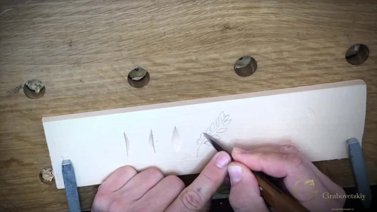 Cutting one side of a leaf and then the other, the same pair of angled cuts used on the practice lines