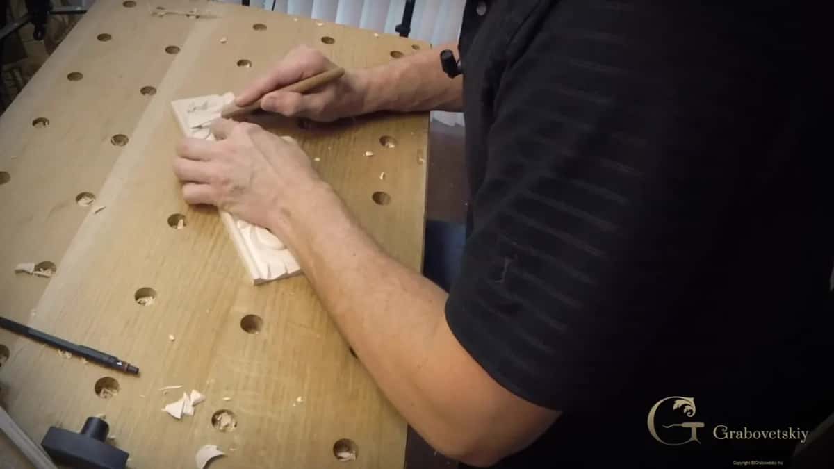 Almost flat against the board, the blade at its lowest angle