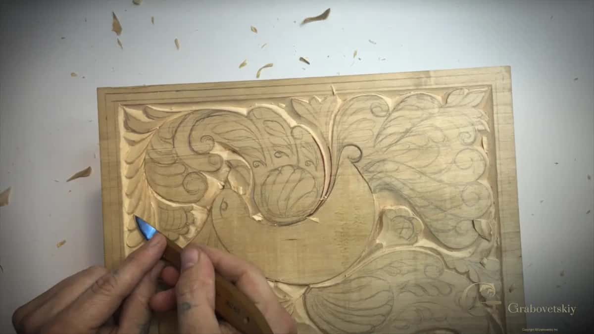 Pencil in hand over a panel that is nothing but movement.