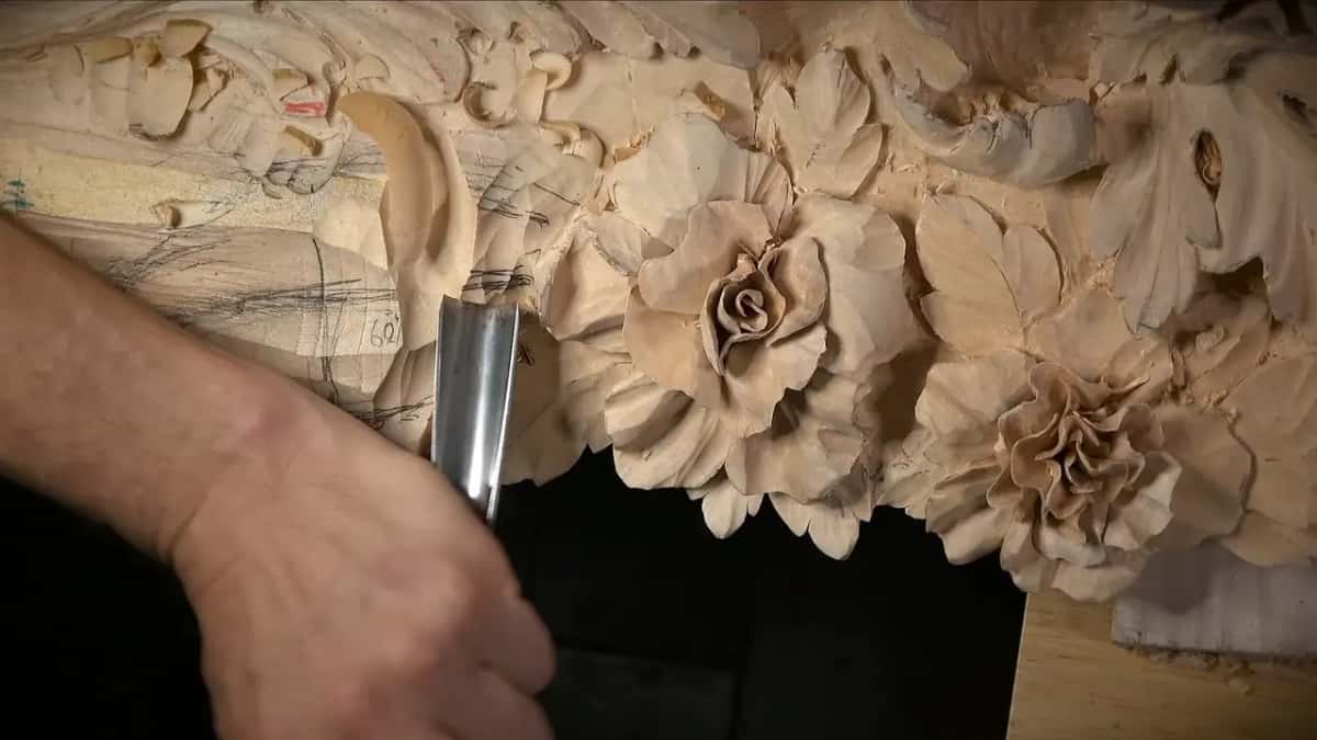 Big gouge held beside two carved roses