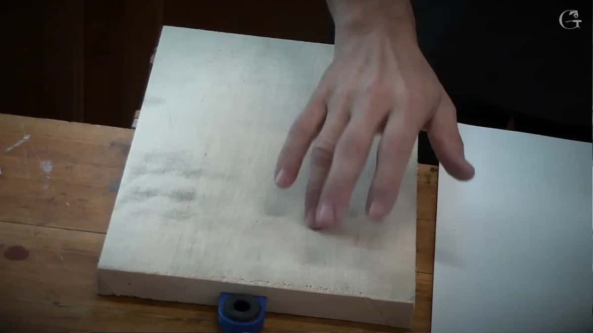 Fingers testing the sprayed face