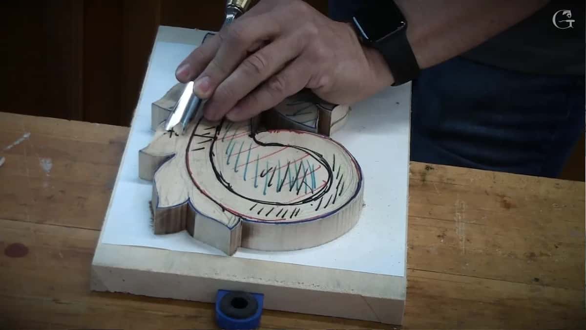 Mid cut, a shaving lifting ahead of the edge