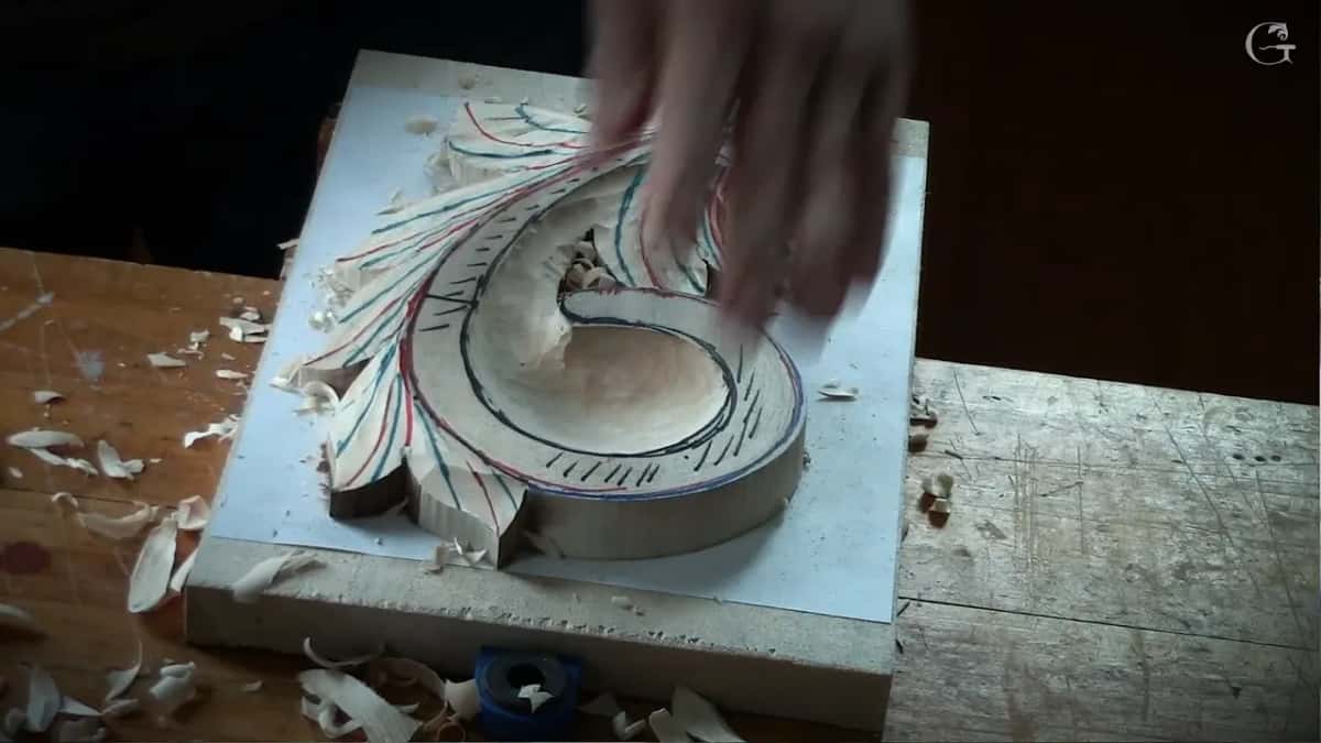Two hands over the finished marking