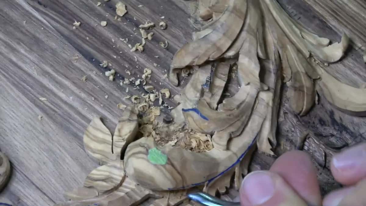 Chips spill from a dark gap between two lobes