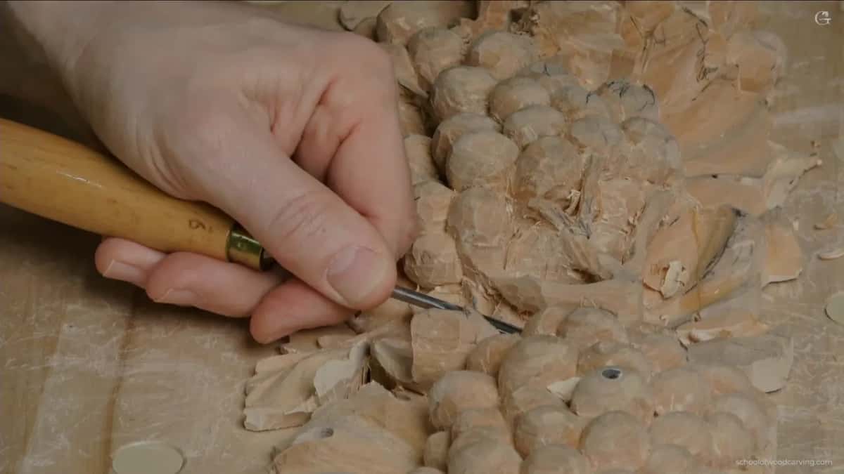 Long handle, one hand, drilling a plug out from under the branch