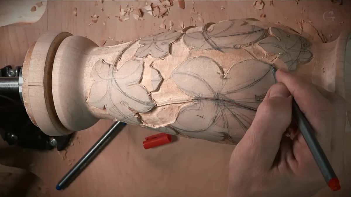 Marker in hand over the roughed leaves