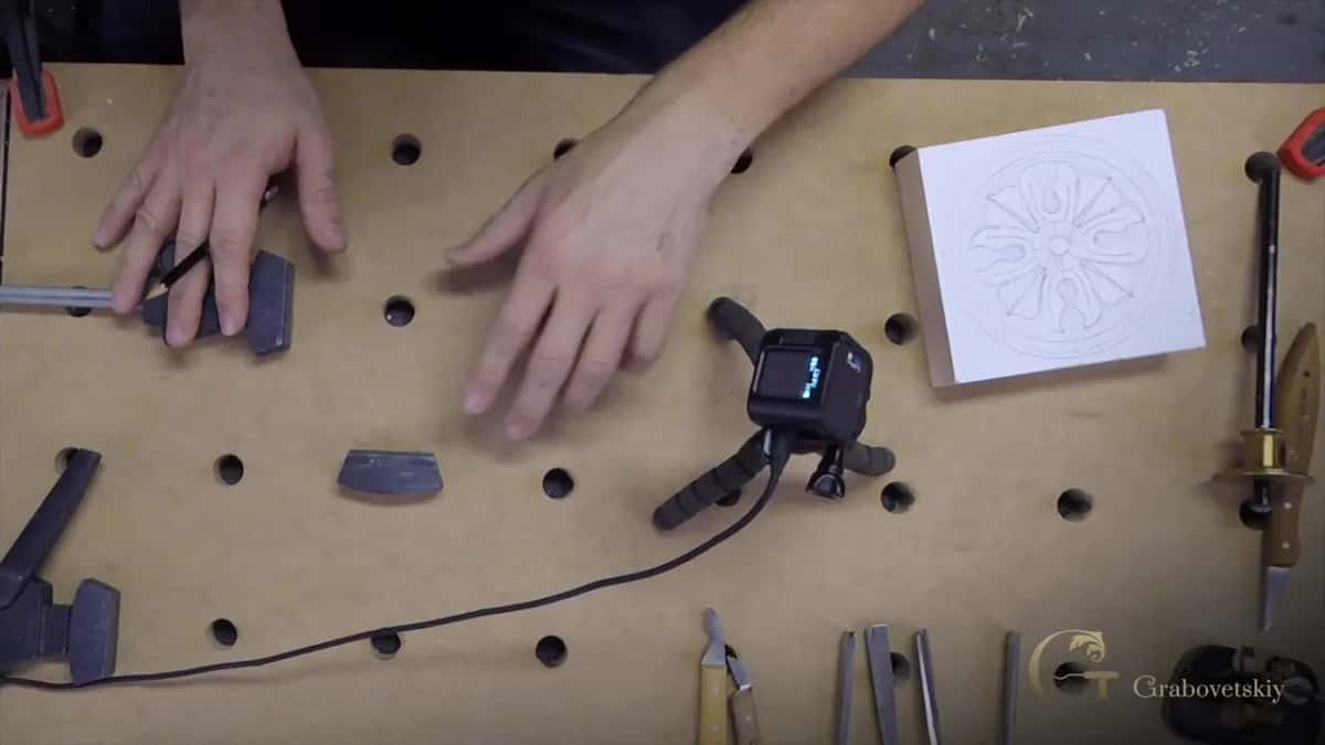 Clamps dropped into the holes either side