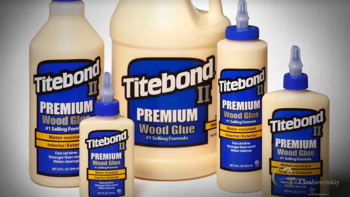 Bottles of the plain yellow glue he uses