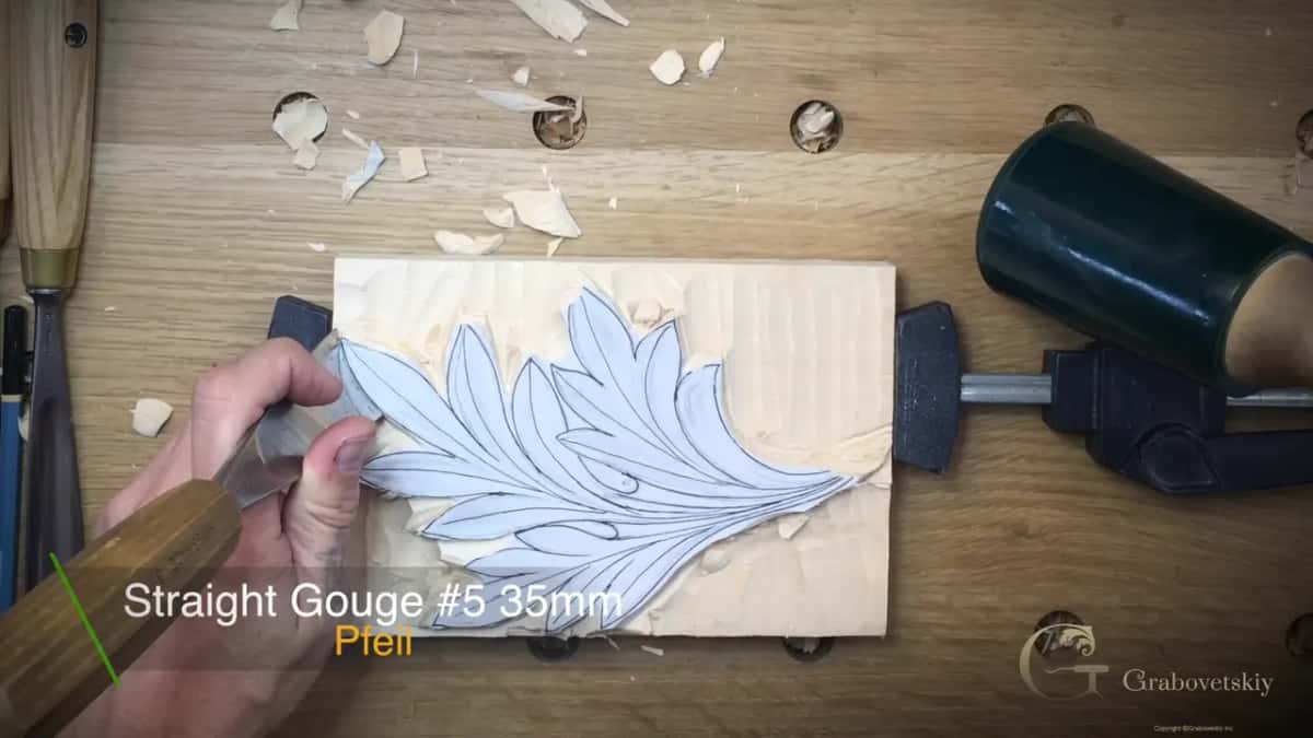Caption naming the tool on screen, a straight number five at thirty five millimetres