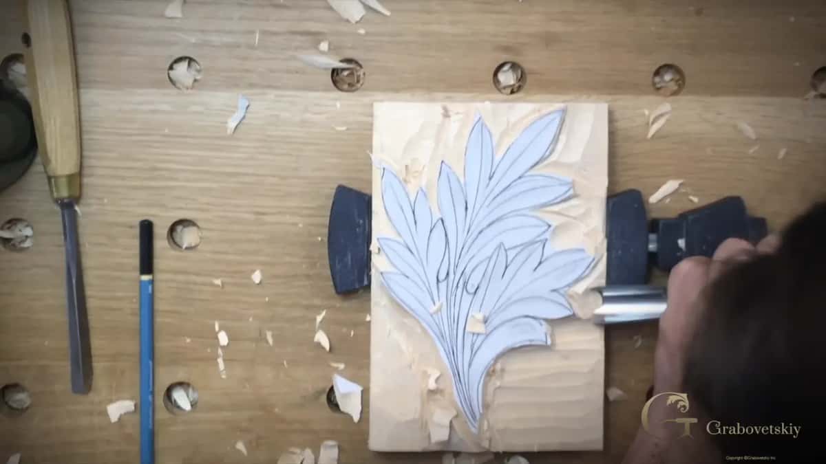 The outline cut right round, which is the moment a drawing turns into a carving instead of a picture