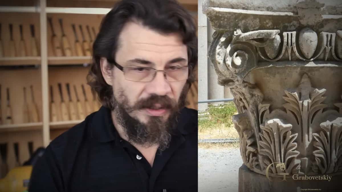 A stone capital beside him on screen, the carved acanthus still crisp after a very long time indeed
