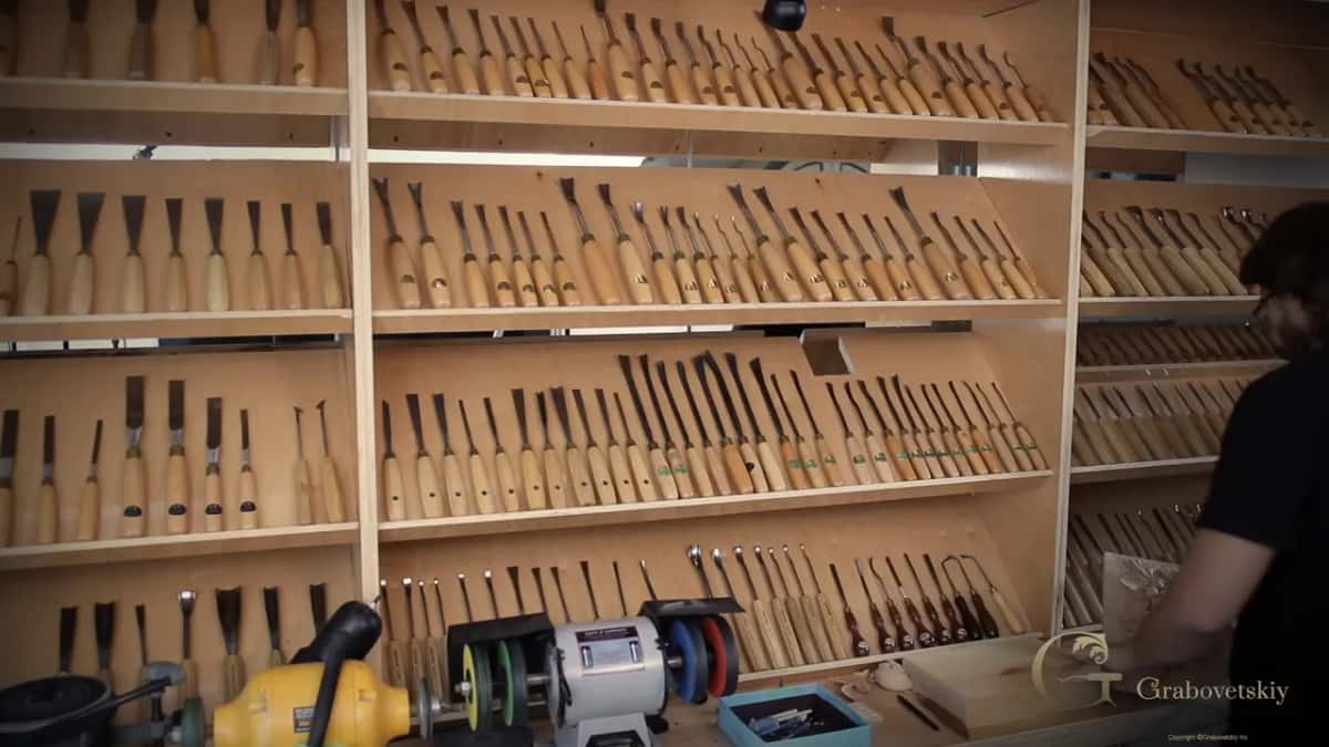 The tool rack that runs the length of one wall, which is most of what a visitor notices first