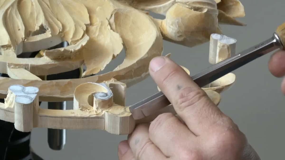 Gouge set into the hollow of a curl, thumb steering it