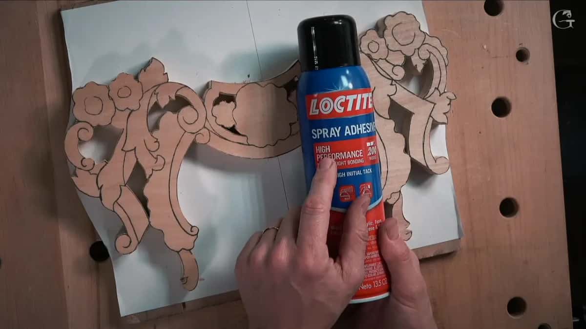 Loctite spray adhesive can held over the sawn blank, label reading high performance and high initial tack