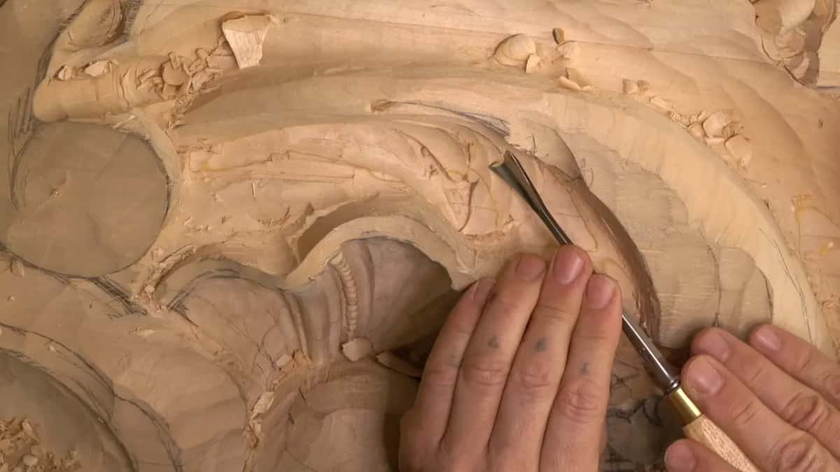 A straight gouge with a brass ferrule.