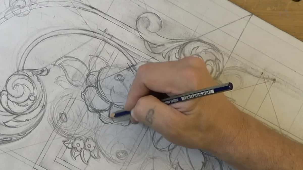 Pencil laid flat against the paper to draw one petal tucked under the petal above it
