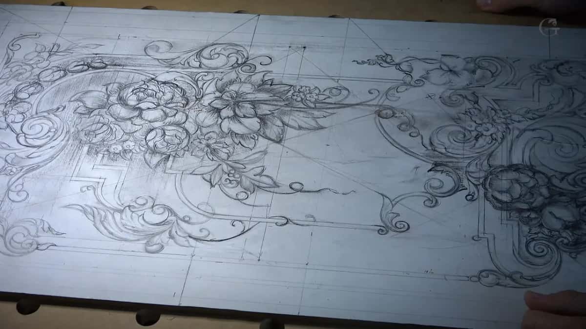 Whole panel drawing finished end to end, seen from above with one hand at the right edge