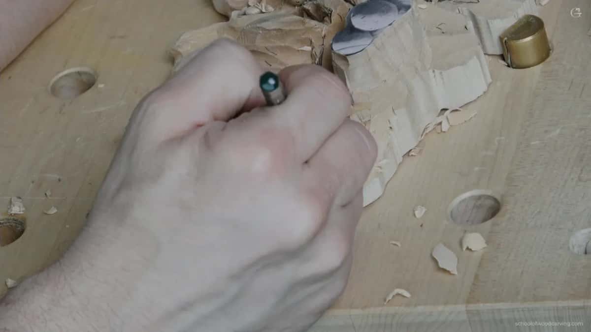 Gripping a dark handled tool to bring the whole area down and blend the error away
